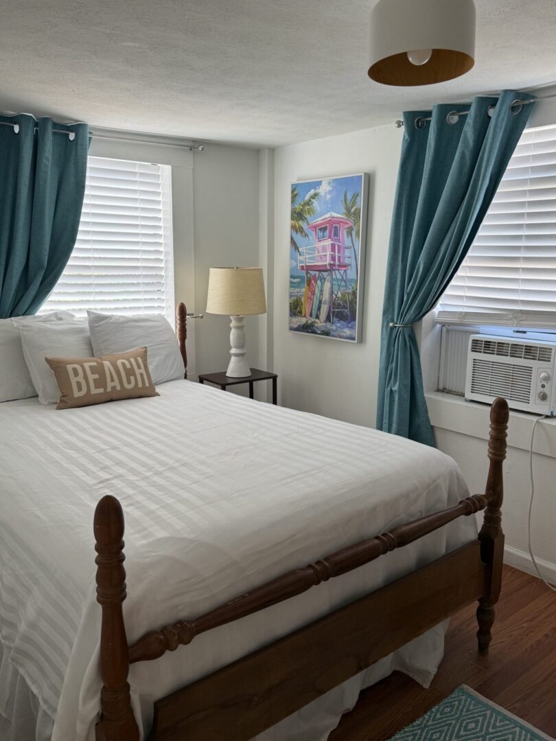 Cozy beach-themed bedroom with teal curtains