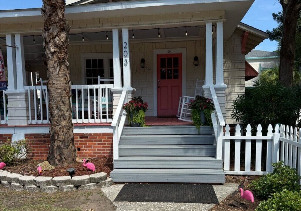 Sea Gables Cottage at the Darlington Inn & Cottages, front porch with a coral door